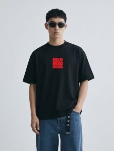 Model wearing the black Boku No Hero Academia oversized t-shirt, front view