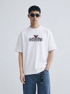 Hollow Oversized T-Shirt White - Model Front Model wearing the white Hollow oversized t-shirt, front view